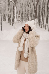 Young Asian woman in winter location with snow