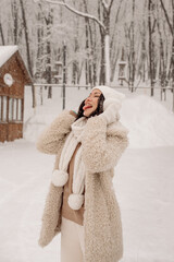 Young Asian woman in winter location with snow