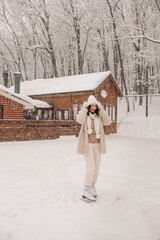 Young Asian woman in winter location with snow