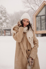 Young Asian woman in winter location with snow
