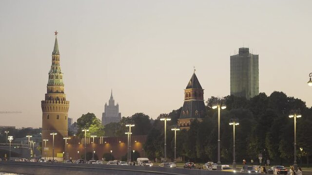 View of Moscow architecture. Action. Evening bright buildings of the capital of Russia with towers , bridges and large buildings .