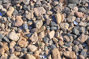 Sea pebbles, stones polished by water, background, texture,