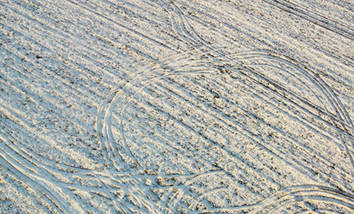 Texture of a snowy winter field. Photo from above