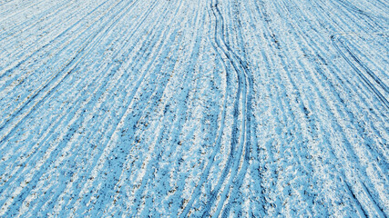 Texture of a snowy winter field. Photo from above