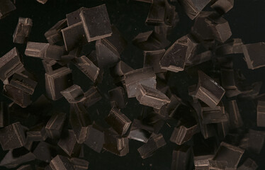 Freeze Motion Shot of Exploding Chocolate Chunks, close-up