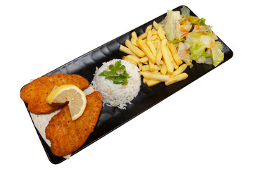 Chicken schnitzel presentation on black plate