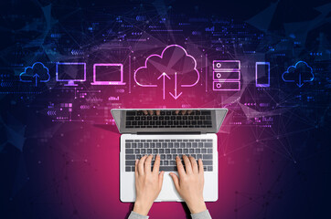 Cloud computing with person using a laptop computer