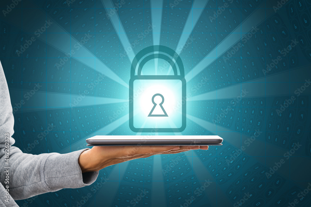 Poster close up of hand holding tablet with glowing padlock on coding background. digital safety, security,