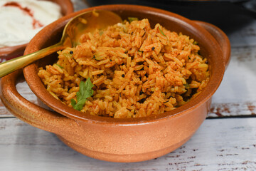Mexican rice in traditional clay pot