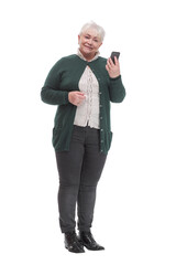 Happy senior woman holding cell phone, smartphone in hand read and write sms