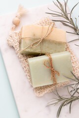 Handmade natural soap on pastel background.