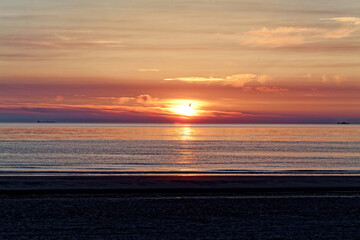 Amazing sunset landscape in the North Sea. Texel, Netherlands