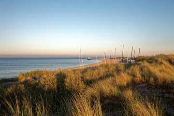 Fishing boats on the North Sea shore on the Texel island, Netherlands
