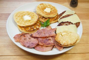 Breakfast Plated-Waffles, Sausage, Toasted English Muffin, and Ham Slices