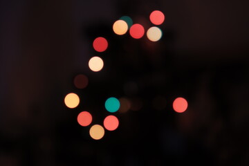 Defocused background. Bokeh abstract texture. Colorful. Circular points. Blurred bright light. 