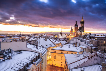 Illuminated winter city skyline on evening, Cracow, Poland, Europe.