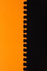 black on orange paper with pattern