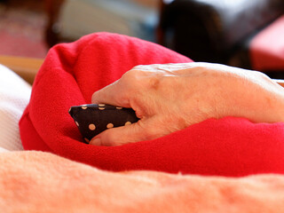 Insights into the home care of relatives in one's own family with dementia. etc. Hands of a...