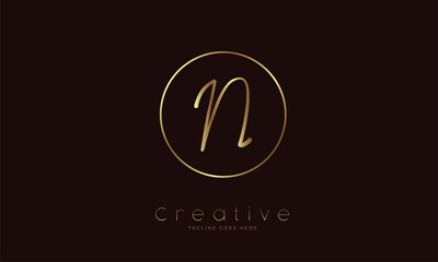 Initial N Logo. hand drawn letter N in circle with gold colour. usable for business. personal and company logos. vector illustration