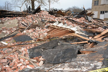pile of rubble from burnt building