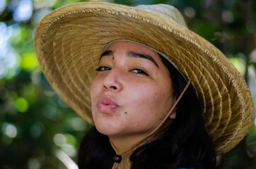 portrait of a woman in a hat