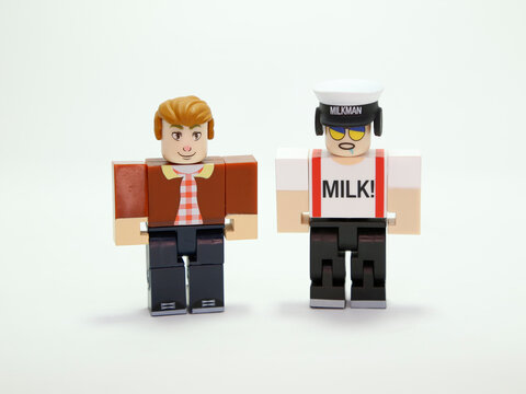 Plastic Toy Figure With Character From The Roblox Video Game. Roblox Doll. Roblox From Pet Simulator Game. Boy. Man. Milkman. Milk Seller. Businessman.