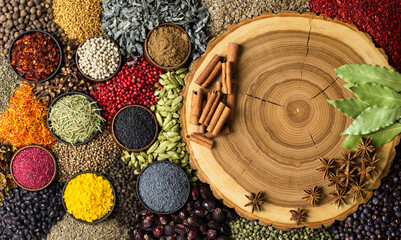 Collection spices for cooking delicious food. Colorful seasoning background, top view.
