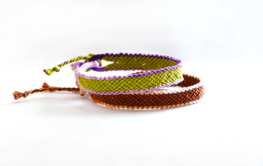 DIY woven friendship bracelets with different braiding. Summer accessory