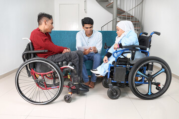 Obraz premium Group of southeast Asian adult child girl male female special need medical down adhd autism syndrome disabled wheelchair work study business discuss talk