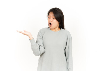 Showing Product on Open Palm Of Beautiful Asian Woman Isolated On White Background