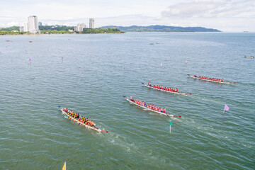 aerial view of a group of dragon boat paddler practice at Likas Bay Sabah Malaysia. Dragon boat...