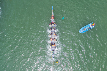 aerial view of a group of dragon boat paddler practice at Likas Bay Sabah Malaysia. Dragon boat...