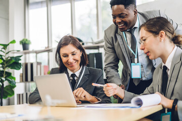 Group of business meeting and discussing strategy with startup project analysis finance process.Success business people plan and brainstorm marketing idea with laptop computer in office.Teamwork