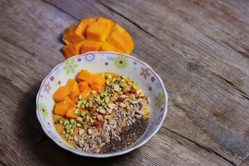 Mango smoothie photograph from side view