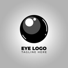 an eye-shaped logo, simple and attractive, can also be in the form of a billiard ball, suitable for community or group logos