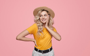 Stylish blond woman touching cheek