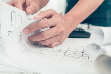 Architect engineer read drawing design working on bueprint. House planning design and construction...