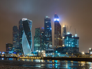 Naklejka premium Moscow city at winter night. Modern skyscrapers in Moscow-city downtown. Moscow, Russia