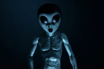 Alien creature on black background