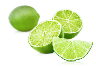 whole, half and slice of lime on white isolated  background
