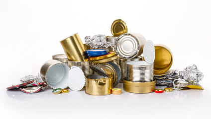 Pile of Separate collected metal garbage. Iron stuff for recycle on white background. Eco friendly concept. Recyclable metal waste: tin cans, foil, steel covers. Zero waste concept. Save the planet - obrazy, fototapety, plakaty