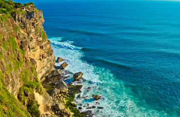 View of Uluwatu cliff and blue sea in Bali, Indonesia