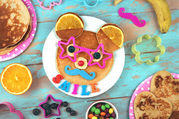 Fun food for kids. Bear or mouse shaped pancakes. Healthy eating for children. Creative idea for kids breakfast. 