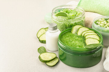 Homemade cosmetics with cucumber. Natural cream, sea salt, body lotion, and soap