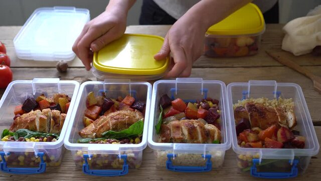 Restaurant offering takeout or delivery during the coronavirus pandemic. Prepared meals in plastic containers. Ready-to-eat food from a certified home-kitchen, restaurant, cafe