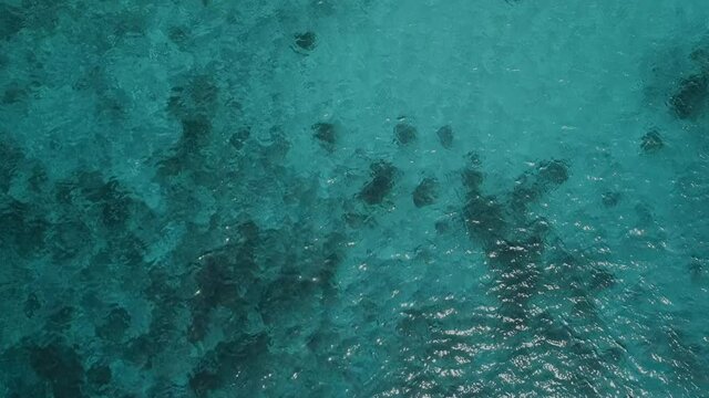 High altitude drone shot  at the caribbean sea on the Kenepa beach in Curacao