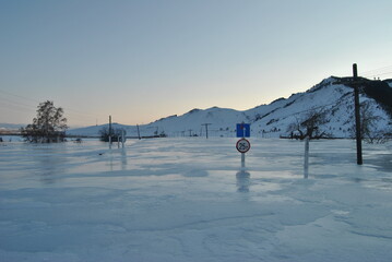 Baikal. Baikal ice. Winter road on Lake Baikal. Siberia.