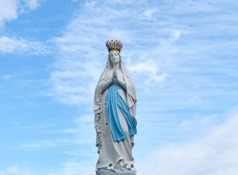 sculpture of the Virgin Mary in the sanctuary ofLourdes, France. place of worship and pilgrimage for christians