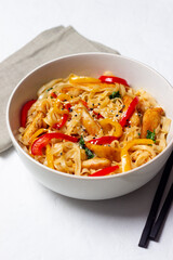 Udon noodles with chicken, pepper and sesame. Chinese food.