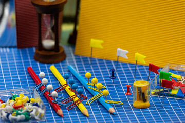 Colored pencils and push pins